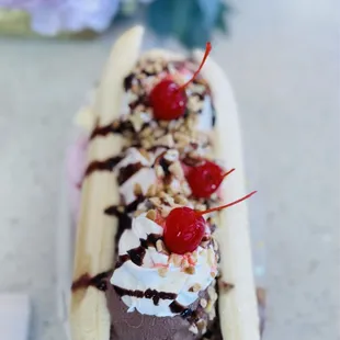 Yummy banana split with vanilla, strawberry and chocolate