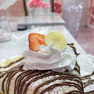 Build your own crepe with strawberries, bananas and Nutella.