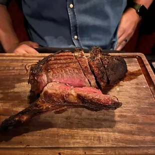 Dry-aged bone-in ribeye. A little overcooked actually