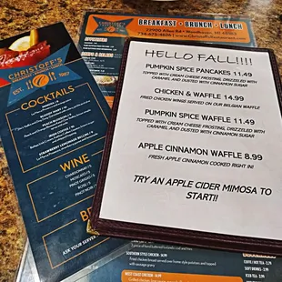  a menu and a drink