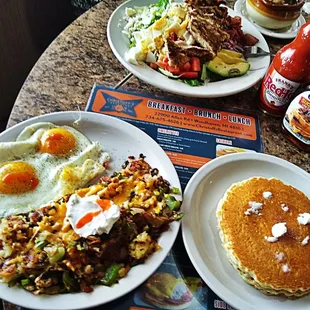  two plates of food on a table