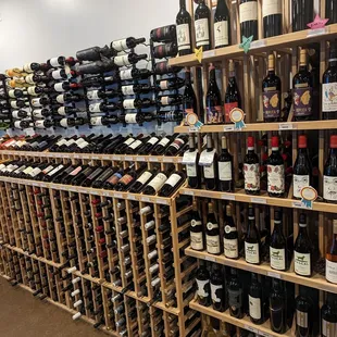 rows of wine bottles on shelves