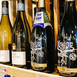 bottles of wine on a shelf
