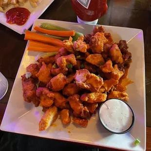 Creamy buffalo sauce 1 lb boneless wings, comes with a side of celery and carrots and some ranch