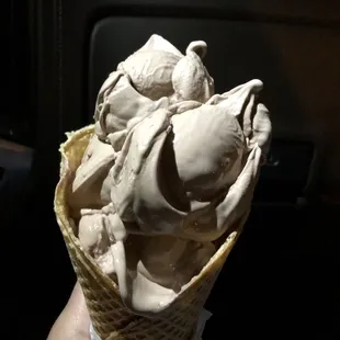Four scoop chocolate in a waffle cone
