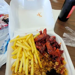 Boneless ribs with fried rice and french fries delicious