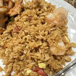 Close up of the fried rice with pork and shrimp in it once I had it home on a plate. Great flavor.