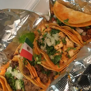 Tacos (carne asada, chicken, the closed one is chorizo)