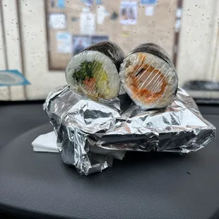 Fish cake Veggie Roll... Spicy Shrimp Tempura Roll (my fave), and wrapped in foil is the 2-piece Chicken and rice.
