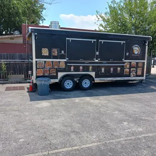 a food truck parked in a parking lot