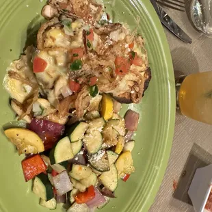 Grilled avocado with extra veggies!! Absolutely delicious!