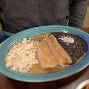 Chicken enchiladas with Chipotle Wine sauce.