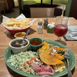 Quesabirria tacos with cilantro rice and black beans