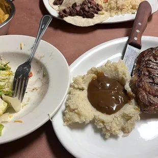 a steak and mashed potatoes