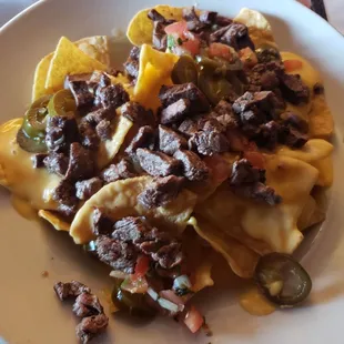 The best nachos with yummy steak!