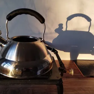 A shadow of the tea kettle in the hermitage.