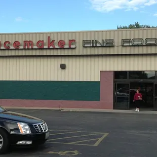 a car parked in front of the store