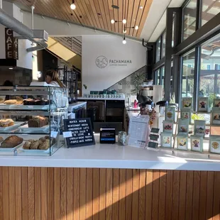 a counter with a variety of pastries