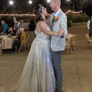 bride and groom dancing
