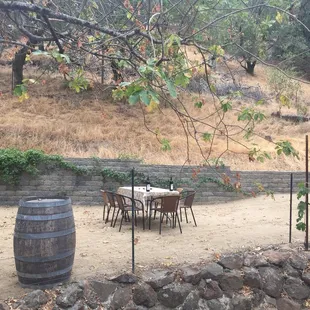 a patio with a table and chairs