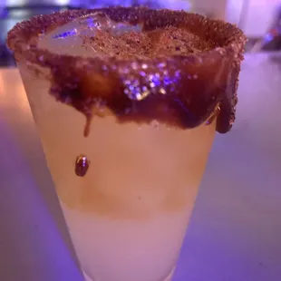 Michelada with Tequila, Lime juice, and a Chamoy/ Tajin dipped rim