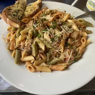 Vodka penne and pork ragu with pressed herb cheese toast. OMG so flavorful, 5 stars!