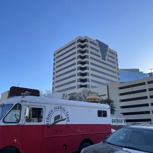 a red and white food truck