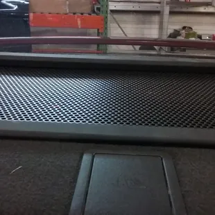 The inside of the Ford Focus... custom port from the trunk to the inside of the car with a special made custom grill.