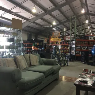 View from one of two couches overlooking the main showroom floor with products.