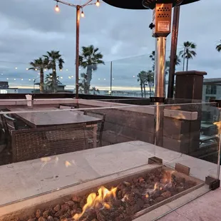 The warm fire pit with a view of the ocean.  Great place! I highly recommend this place.