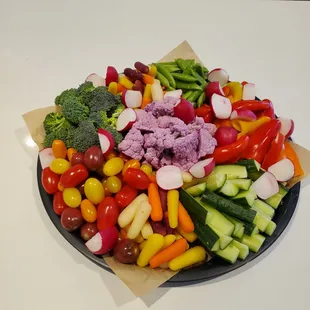 a plate of fresh vegetables