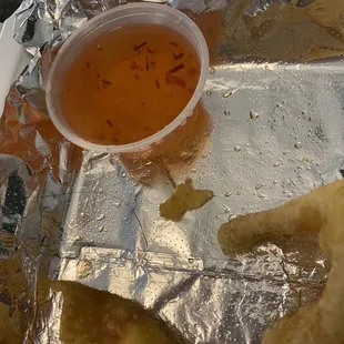 a bowl of soup and some chips