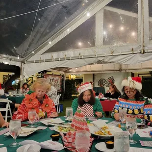 Ugly sweater Christmas gathering bingo playing fun!