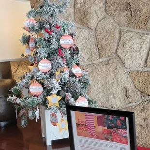 Christmas is about giving.  The giving tree (adopt a child in need) @ the Pacific Club!