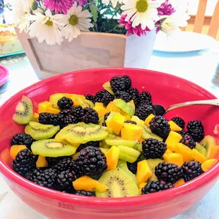 Bowl of blackberries, kiwi, and mango from a week's box!