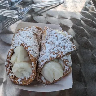 Meatball sandwich, caprice and fresh fruit signs along with delightful cannolis.