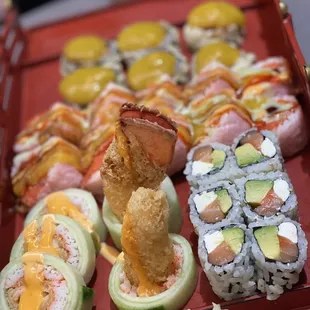 Back- Fantastic Tempura Roll middle- Empire Roll left-Bomb roll right-Philadelphia Roll