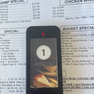 a menu and a cell phone