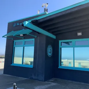 the reflection of the ocean in the windows