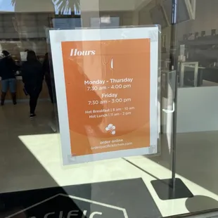 a sign in the window of a restaurant