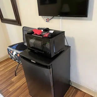 Refrigerator, microwave and tv.