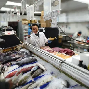 a man in a fish shop