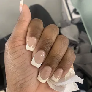 Look close, they look very cloudy. She polished it and the polish under the white tip is poorly done and not at all what I asked for.