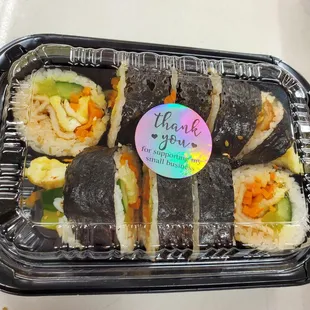 a tray of sushi