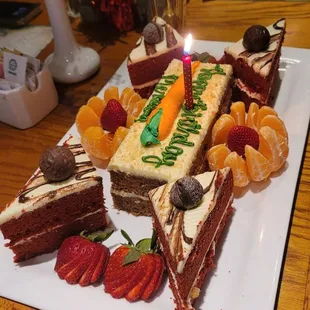 Birthday cake (bought at Publix but waitress fixed it pretty! )