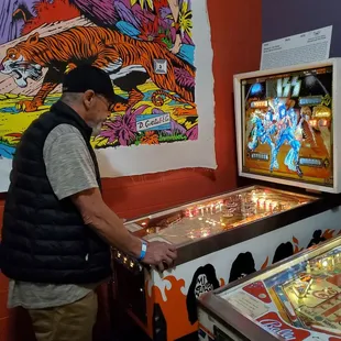 Vietnam veteran playing pinball in Alameda 55 years after being inducted in Alameda.