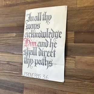 a sign on the wall of a restaurant
