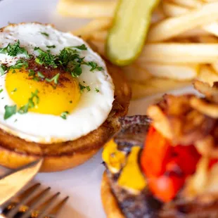 Famous Hangover Burger with double patty, premium bacon, sunny-side-up egg