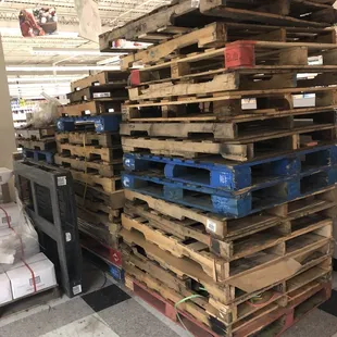 a stack of pallets in a warehouse