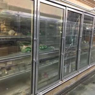 Broken glass door, no lights inside the freezer